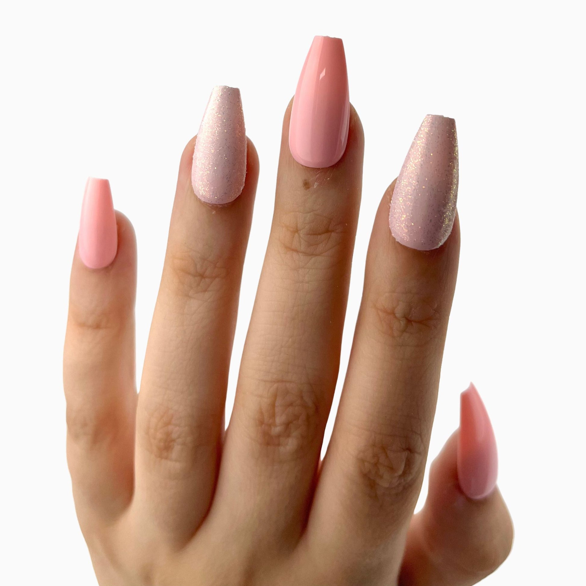 Pink glitter press-on nails tekokynnet